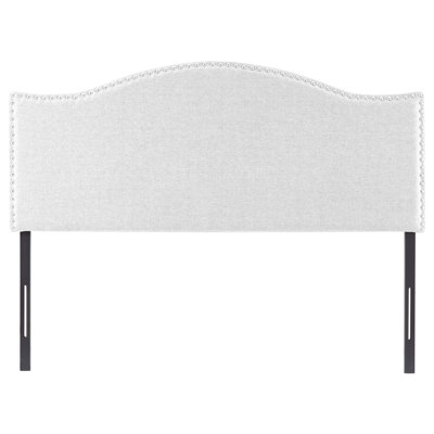 Tête de lit tapissier à garniture cloutée en tissu de lin, pieds en métal
