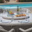 Anissah 8 - Person Patio Dining Set with Round Table