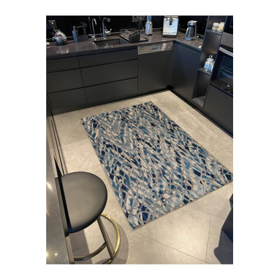 Tapis tissé à motif floral et lavable à la machine