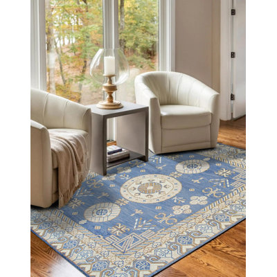 Tapis bleu moderne à motif géométrique circulaire en laine noué à la main
