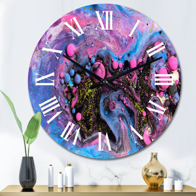Horloge murale moderne rose et bleue