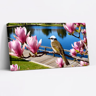 Ensemble de 1 tableau sur toile tendue représentant un oiseau et des fleurs de magnolia rose
