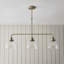 Anais 3lt Linear Pendant light finished in Ant. Brass