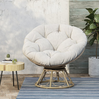 Chaise de patio pivotante avec coussin Mcchesney