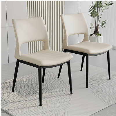 Ensemble de 2 chaises de salle à manger modernes et minimalistes en similicuir blanc, avec un dossier confortable, un support de pieds en métal, convenant aux restaurants, cuisines et bureaux.