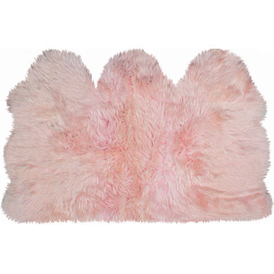 Tapis rose en peau de mouton fait à la main Cyanne