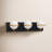 Bertram 3-Light Dimmable Steel Vanity Light with Frosted Globe Shades