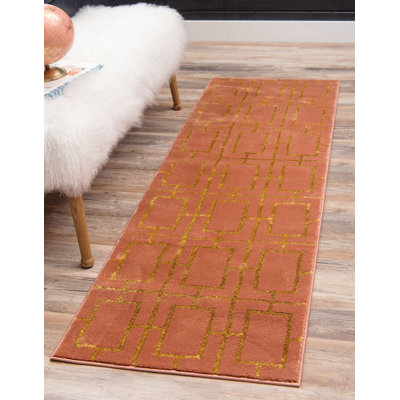 Tapis orange à motif géométrique Glitzy