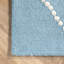 Tapis turquoise / blanc en laine Pariaman-1012910358