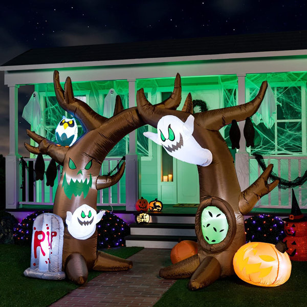 The Holiday Aisle® Scary Tree Archway with Ghost Pumpkin Inflatable ...