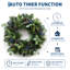 Couronne de Noël pré-illuminée de 61 cm (24 po) avec 20 lumières DEL, pommes de pin, baies bleues et eucalyptus