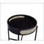 Table de bout Colson à finition noire avec insert et rangement en rotin, parfaite pour un décor moderne et rustique.