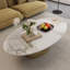 Table basse ovale imitation marbre, 125 x 68 x 39 cm, dessus en pierre frittée, finition blanche et dorée