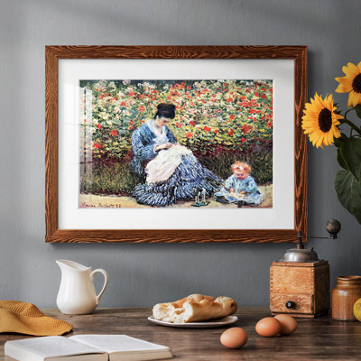 Madame Monet et son enfant par Monet