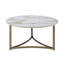Table basse ronde moderne avec plateau en pierre frittée élégante et touche champagne