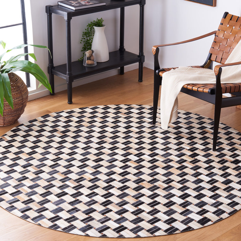 Tapis en cuir noir / ivoire Mahsa Studio, Rond 6 pi