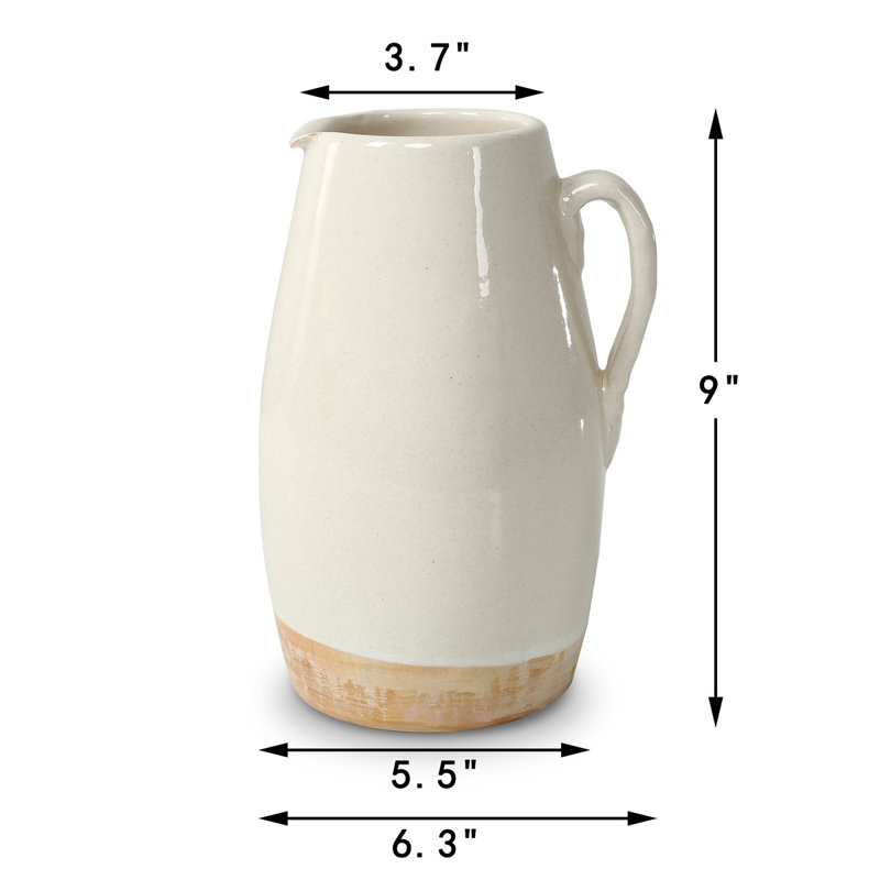 Approx. 9" High Off Whtie Ceramic Pitcher