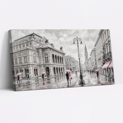 Tableau sur toile représentant une rue de ville en noir et blanc avec des parapluies roses