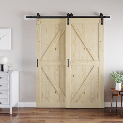 Portes doubles de grange coulissantes à panneaux en bois massif