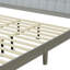 Lit plateforme en bois massif avec tête de lit tapissier, idéal pour différents styles de chambre à coucher et confort durable