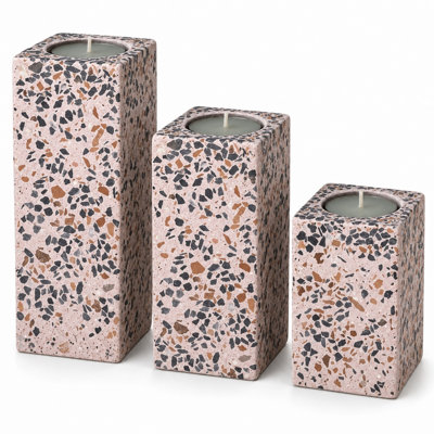 Bougeoirs en ciment éclaboussés