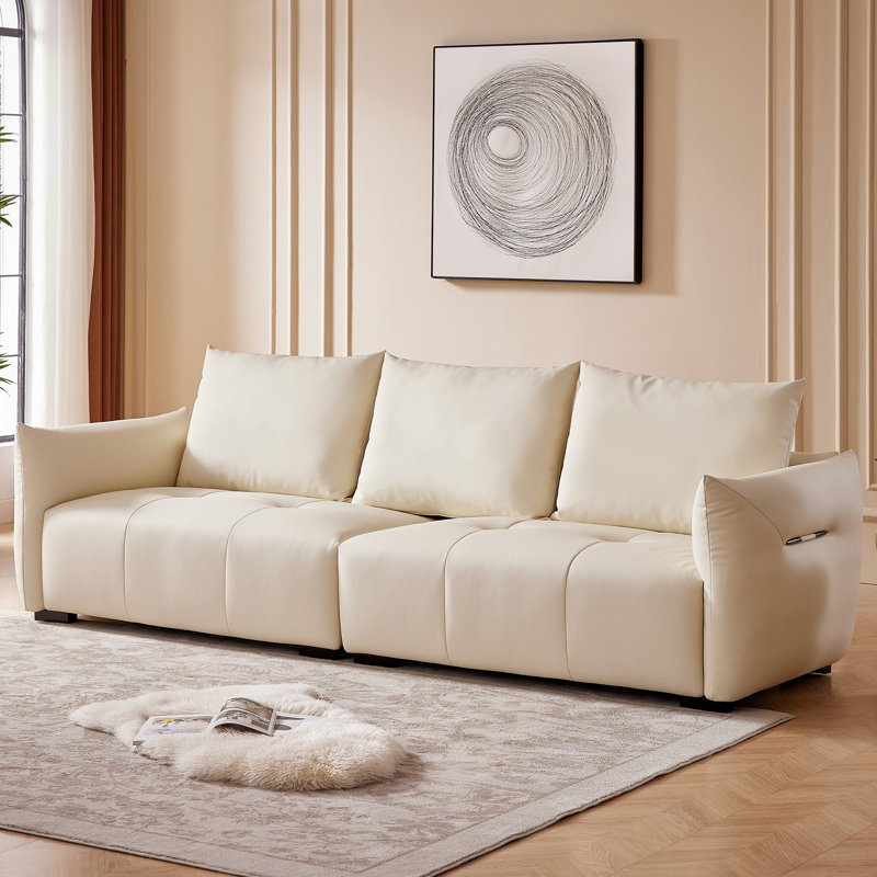 Caytie 110.2'' Leather  Sofa,Modern Black Cloud Couch With Tufted Seats And Unique Flared Arms, White