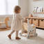 Poussette et centre d'activités en bois avec jeu de rôle, trieur de formes et rangement