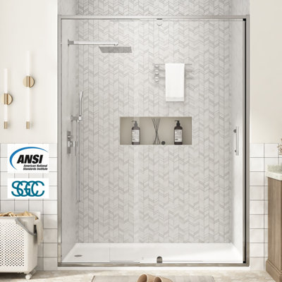 Porte de douche pivotante encadrée de 50 à 54 po L x 71 po H, en chrome, avec verre trempé transparent de 1/4 po, pellicule anti-éclats et revêtement facile à nettoyer.