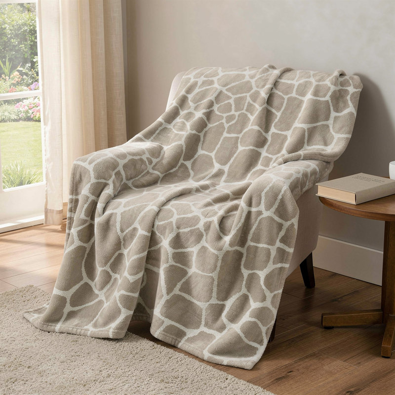 Jeté 50 po x 70 po en microfibre taupe et ivoire