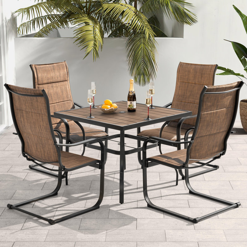 Ensemble de salle à manger de patio 5 pièces avec plateau en faux bois, chaises à ressorts en C PVC-coated polyester rembourrées