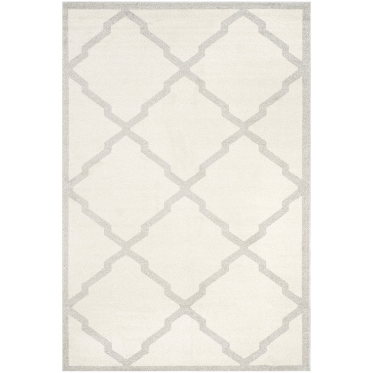 Tapis beige à motif géométrique Ammundsen