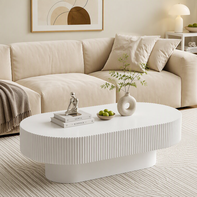Table basse ovale élégante de 43,3 po avec plateau de 6,8 po d'épaisseur, table de bout cylindrique de style crème moderne, table centrale cannelée minimaliste avec base robuste pour le salon, assemblage facile, blanc