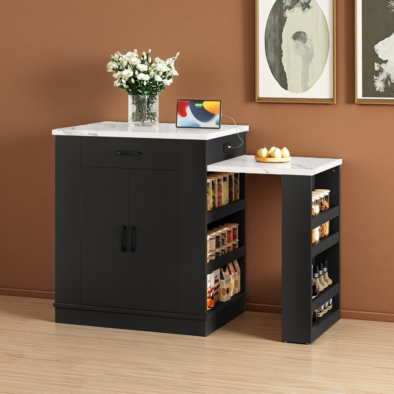 Console d'îlot extensible avec tiroirs, armoire à deux portes et tablettes ouvertes. Sert de table de salle à manger, barre de petit déjeuner temporaire