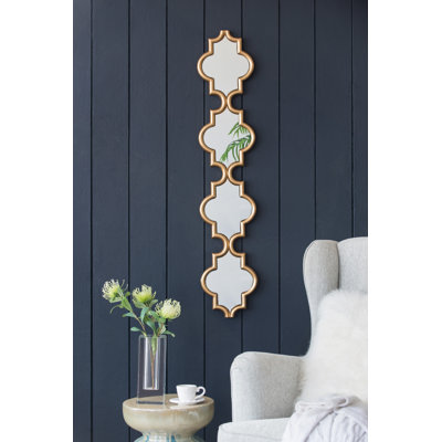 Miroir mural doré à quatre niveaux
