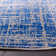 Riebe Abstract Blue/Silver Area Rug