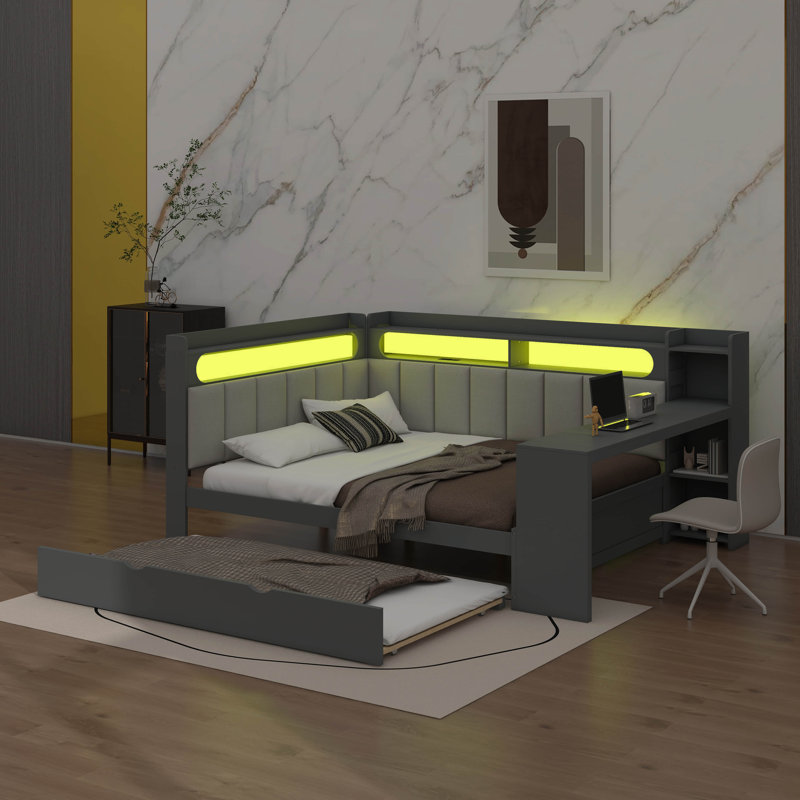 Full-Sized Daybed With Storage Units, A Trundle Bed, A Charging Outlet, LED Lighting, A Desk, And An Upholstered Headboard And Back Support