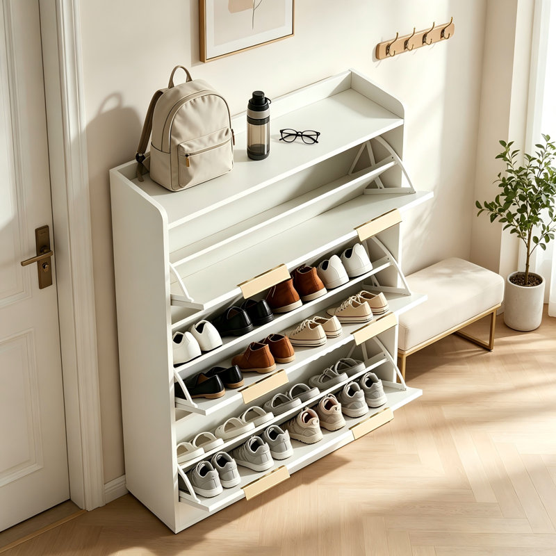 Armoire à chaussures 3 tiroirs avec grille supérieure, panneaux de porte en panneau de fibres à densité moyenne thermoformés, coutures et poignées de porte dorées champagne, pieds en bois massif conique