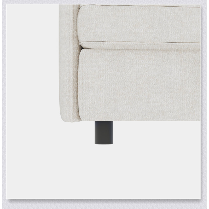 Canapé en tissu beige avec des sièges confortables et un design élégant, parfait pour les espaces de vie modernes et confortables.