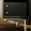 Armoire de rangement moderne à 9 tiroirs en noir avec accents métalliques