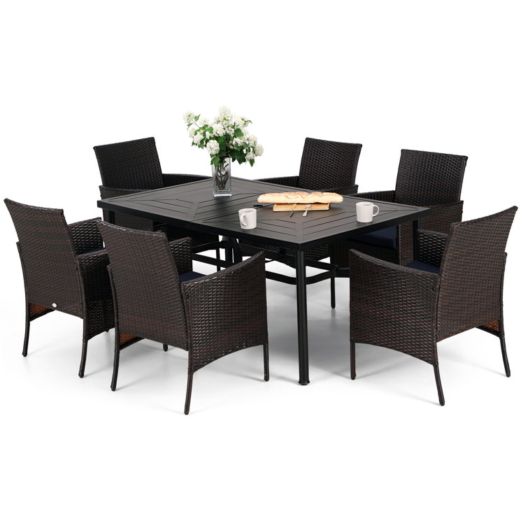Alyah Rectangular 6 - Person 64" Long Dining Table with Cushions