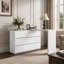 Commode blanche à 6 tiroirs avec plateau allongé et design sans poignées, idéale pour coiffeuse et chambre à coucher.