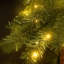 Slender Green Tropical Christmas Tree with Lights-160899562