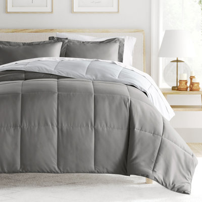 7-Piece Reversible Bedding Bundle - Solid Comforter and Patterned Sheet Set
