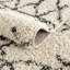 Tapis à poils longs noir et beige Adeesa-1021054368