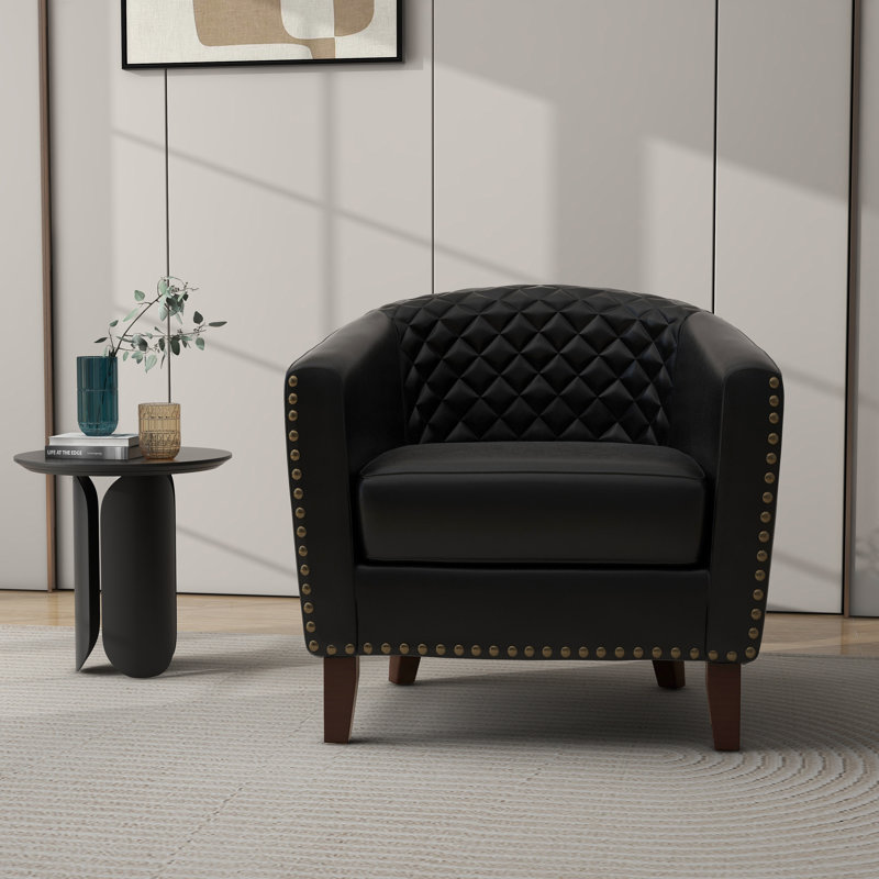 Fauteuil demi-tonneau capitonné en similicuir noir Edvardas, Similicuir noir