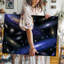 Toile dans un tableau cosmique à couper le souffle, un tableau de galaxies s'étale sur un fond noir velouté-1437436437