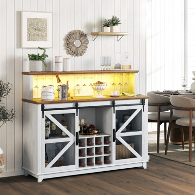 Farmhouse Wine Bar Cabinet with LED Lights, Sliding Barn Doors, 55" Coffee Bar Cabinet with Wine Racks and Glass Holder, Sideboard for Kitchen by August Grove