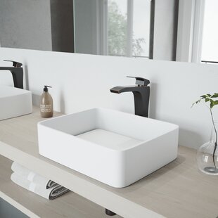 https://assets.wfcdn.com/im/63657605/resize-h310-w310%5Ecompr-r85/4709/47091427/matte-stone-white-stone-rectangular-vessel-bathroom-sink.jpg