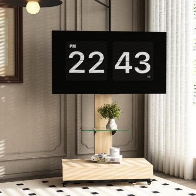 Meuble télé ajustable pour écrans de 32 à 75 pouces, en bois et verre, avec roulettes et tiroir coulissant. Parfait pour le salon, la chambre ou le bureau. Hauteur réglable par rotation à gauche et à droite (30°). Style moderne et élégant.
