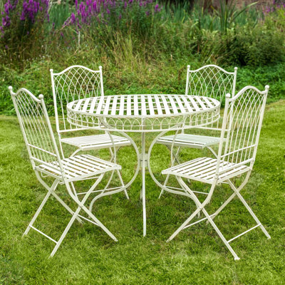 Rosner 4 - Person Patio Dining Set Umbrella Hole Included Round Table